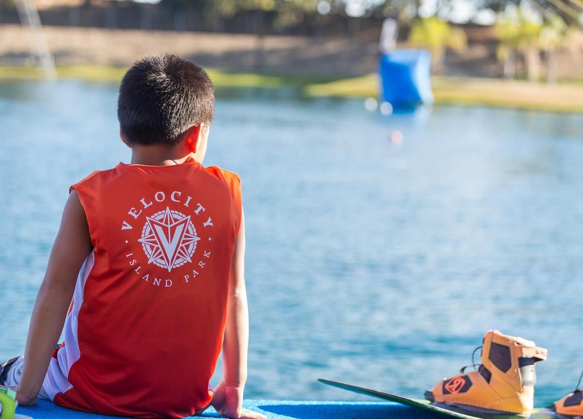 Velocity Island Park team members having fun at the lake